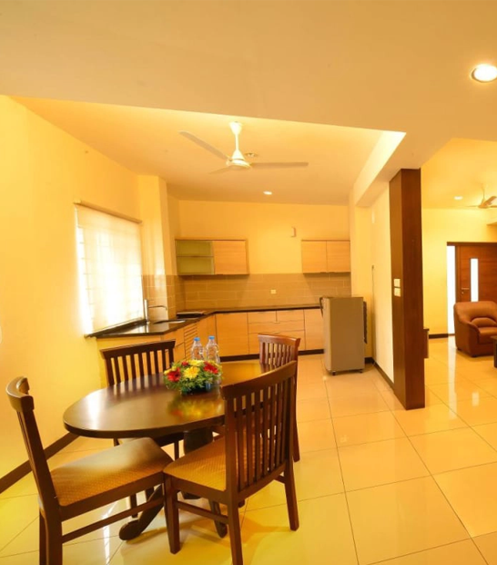 AC & non-AC short and monthly stay serviced apartments near KG Hospital with kitchen & parking.